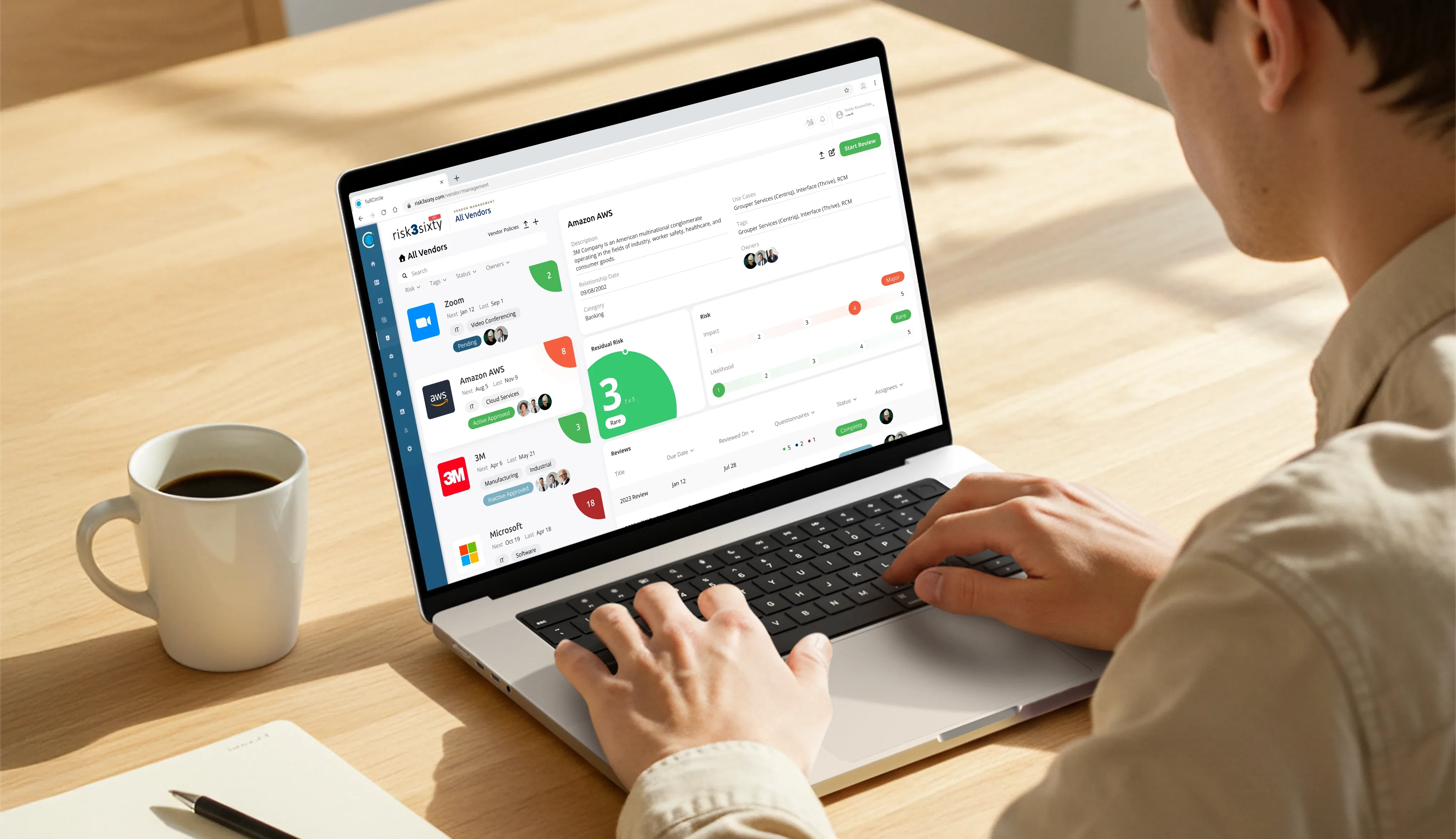 A person using the redesigned Vendor Management page on a laptop